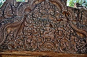 Banteay Srei temple - detail of one of the south annexes of the causeway